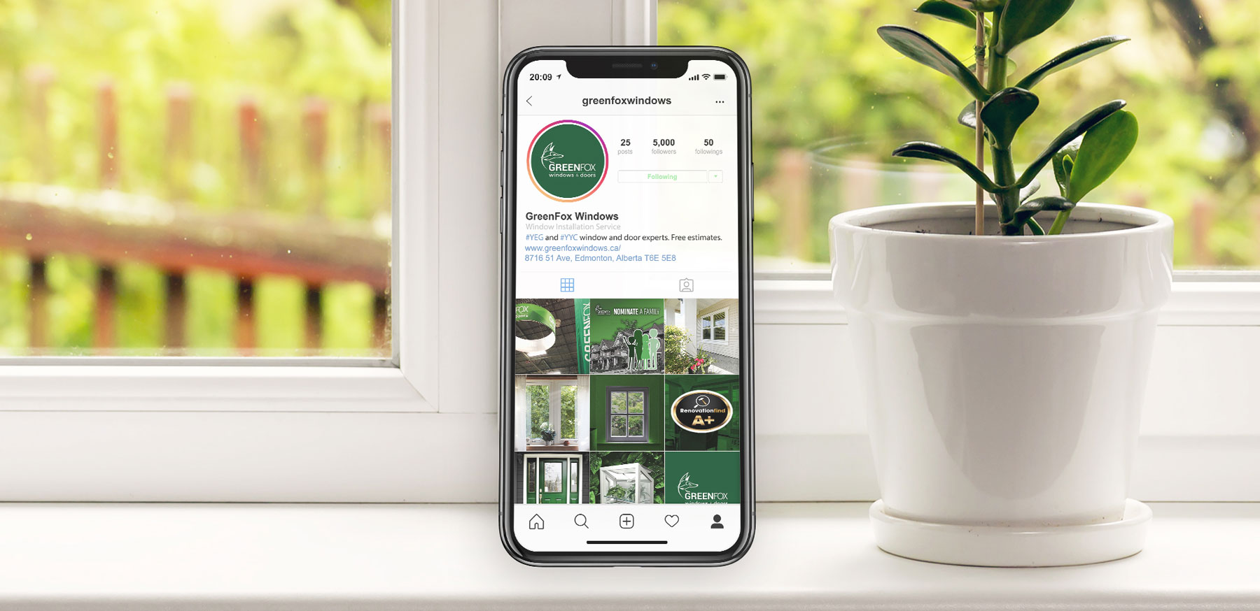 Greenfox Windows and Doors Instagram on a iPhone in the Window